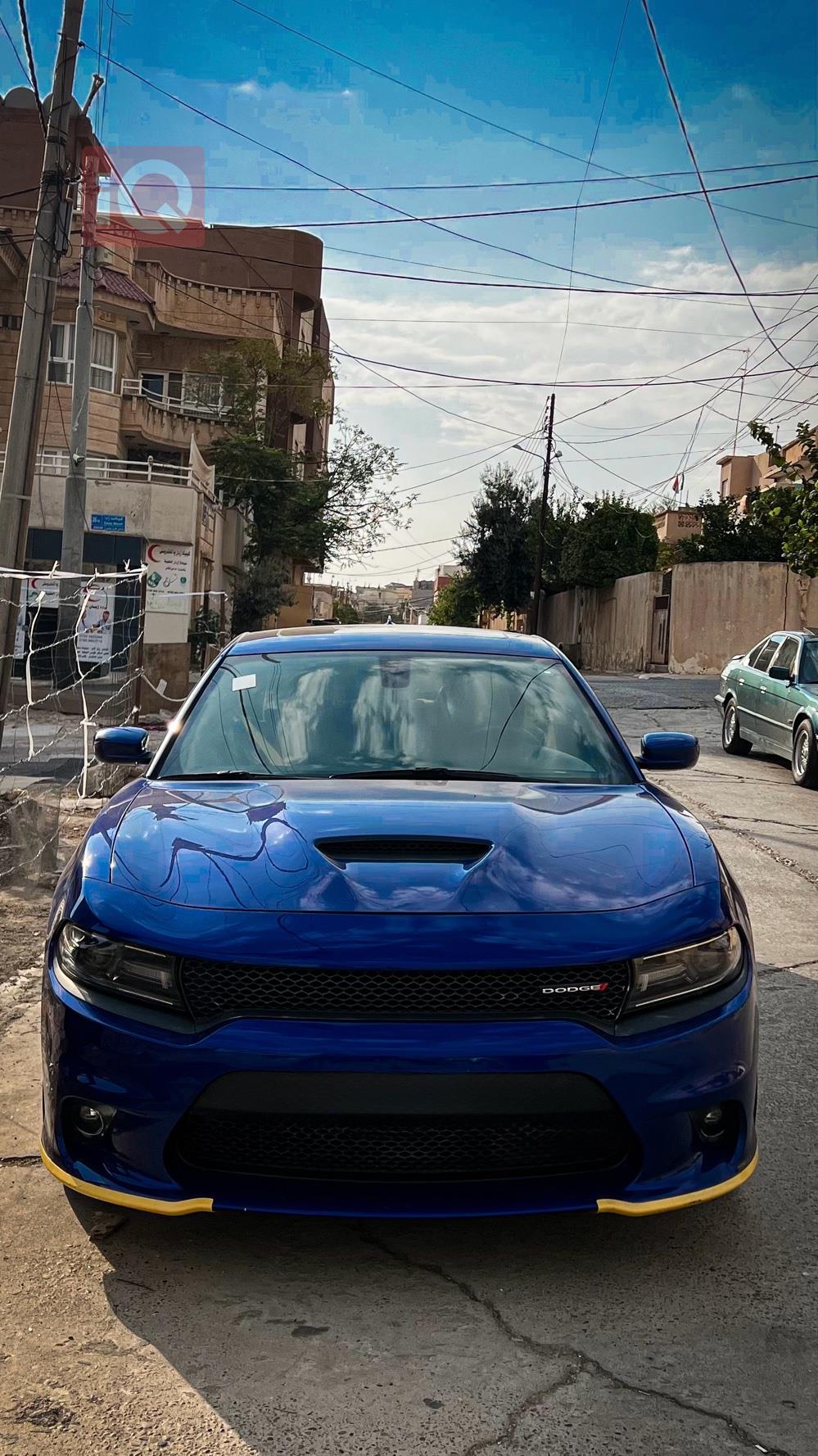دۆج چارجەر